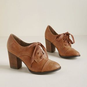 Restricted leather oxford heels.